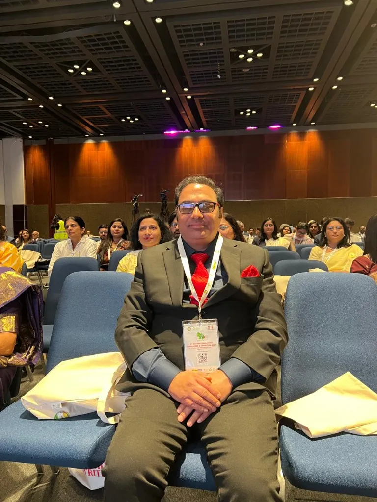 Dr. Anuj Kumar seated at a session of the International Ayush Conference and Exhibition 2026