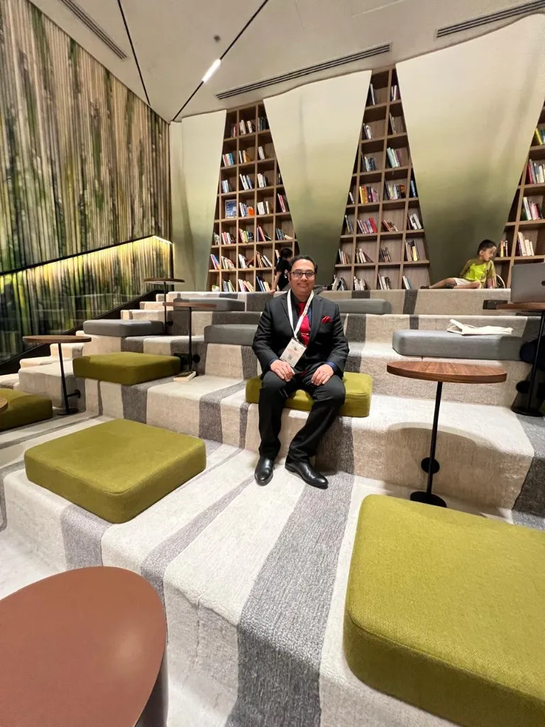 Dr. Anuj Kumar at a conference venue lounge