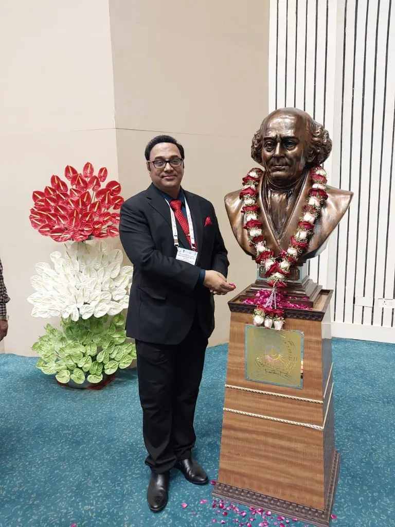 Dr. Anuj Kumar paying tribute at Dr. Hahnemann bust on World Homoeopathy Day